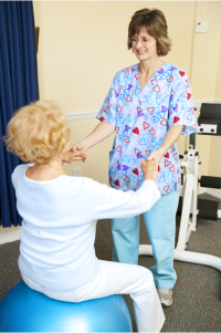 caregiver assist patient doing motor exercises